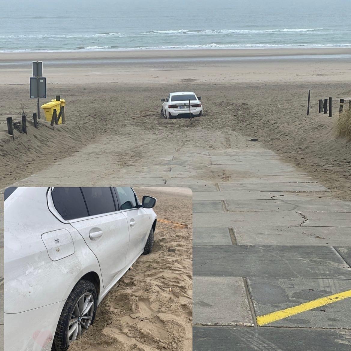 Duitse toerist parkeert auto op het strand van Noordwijk